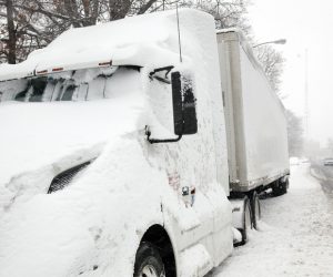 semi truck in winter storm
