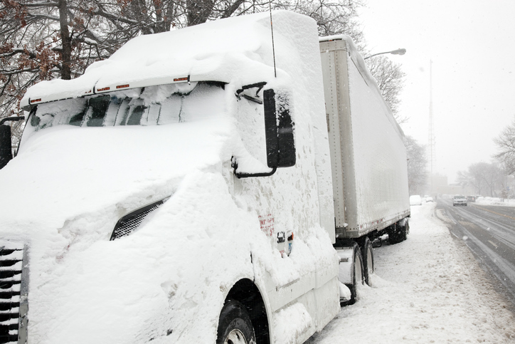 semi truck in winter storm